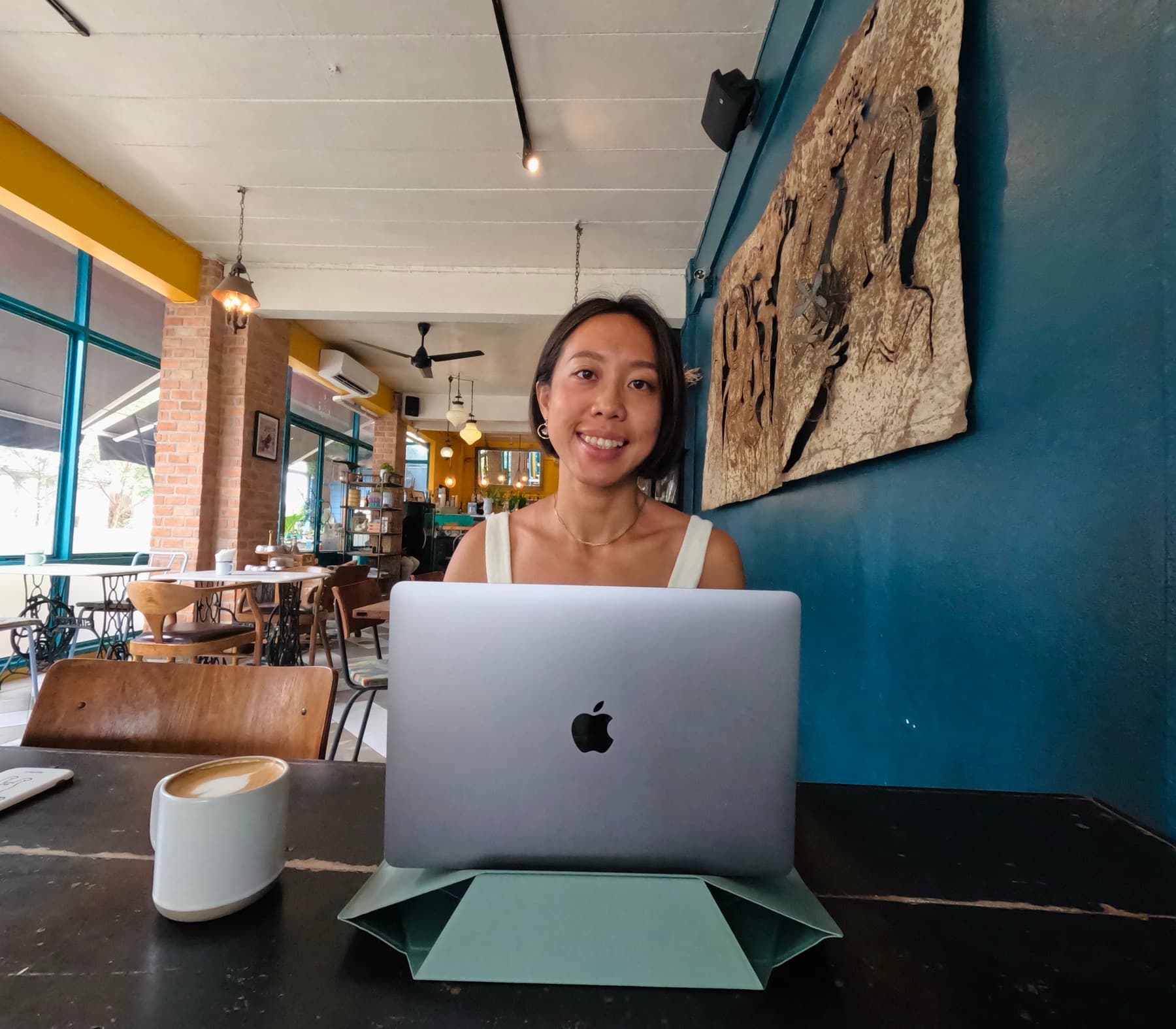 Angel working from a cafe in Bali